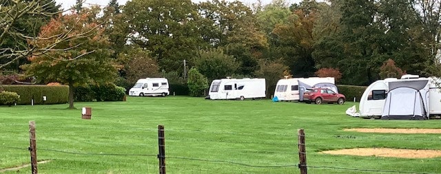 caravans and tent on pitch